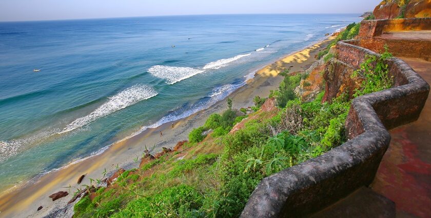 Watching waves crashing the shores of Varkala beach is a must things to do in Kerala.